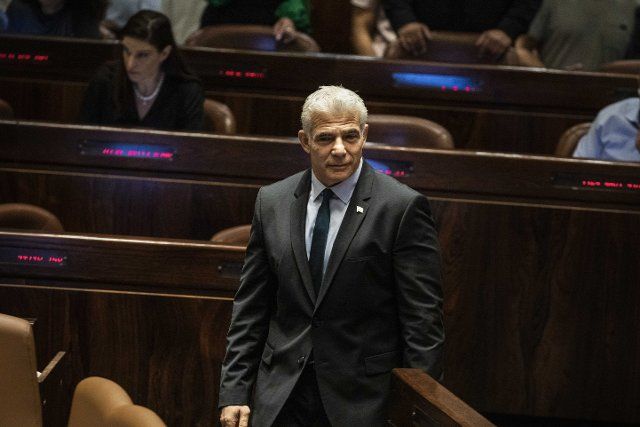 30 June 2022, Israel, Jerusalem: Foreign Affairs Minister of Israel Yair Lapid arrives at the Israeli Knesset ahead of the vote to dissolve the government. Photo: Ilia Yefimovich\/dpa
