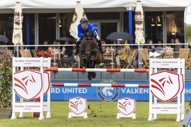 28 May 2022, Hamburg: Equestrian sport\/jumping: Derby Tournament, Jumping, Global Champions Tour - Grand Prix, with jump-off. Marcus Ehning from Germany rides Stargold. Photo: Stefan Lafrentz\/dpa