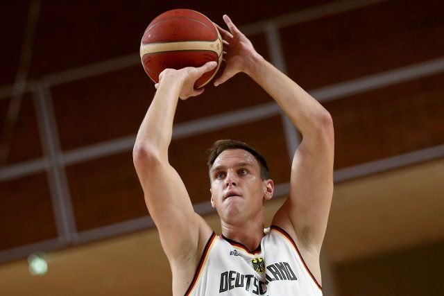 12 August 2022, Netherlands, Almere: Basketball: International match, Netherlands - Germany. Johannes Voigtmann from Germany in action. Photo: Matthias Stickel\/dpa
