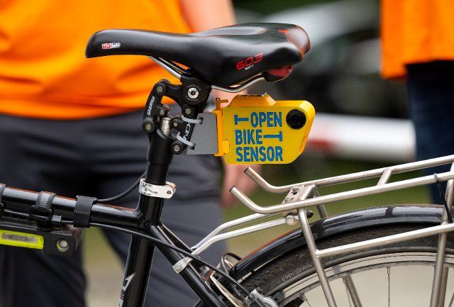 13 July 2022, Bavaria, Munich: A sensor on a bicycle is seen during a press conference on the subject of greater safety when cycling. The sensor, developed by the ADFC, can measure the lateral distance when overtaking. Photo: Sven Hoppe\/dpa