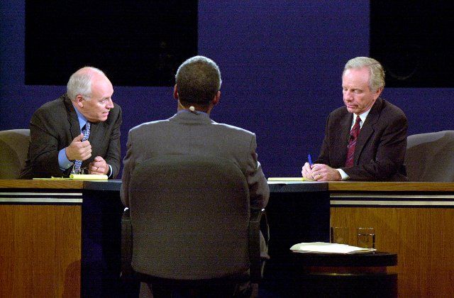 Democratic Vice Presidential Candidate United States Senator Joseph Lieberman (Democrat of Connecticut), right, and Republican Hopeful Dick Cheney, left, aim their comments at each other before moderator Bernard Shaw during the VP debate at Centre College in Danville, Kentucky against Richard B. Cheney Thursday October 5, 2000. Credit: John Simpson - Pool via CNP