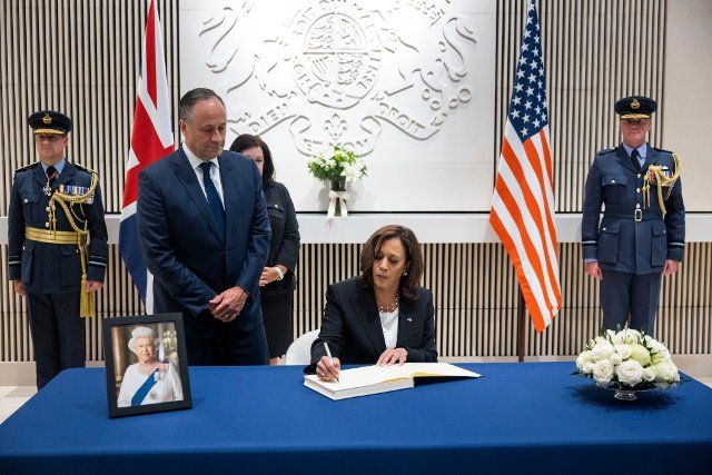 United States Vice President Kamala Harris signs a condolence book to pay respects to Her Majesty Queen Elizabeth II, who passed away on 08 September, at the British Embassy in Washington, DC, USA, 09 September 2022. The 96-year-old queen was the longest-reigning monarch in British history. Second gentleman Doug Emhoff looks on at left. Credit: Jim LoScalzo \/ Pool via CNP