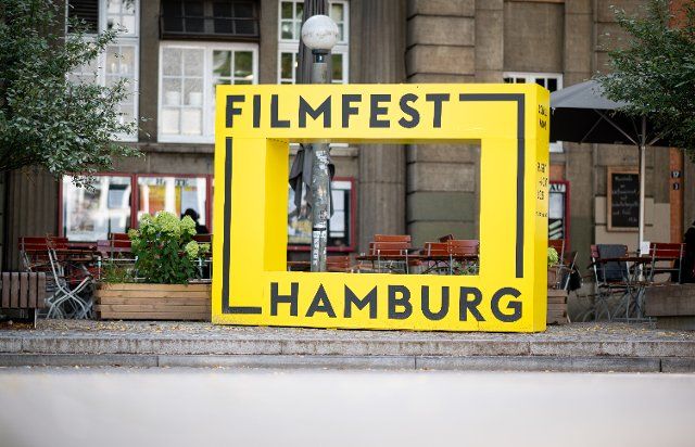 30 September 2022, Hamburg: The logo of Filmfest Hamburg is in front of the Abaton cinema. Photo: Daniel Reinhardt\/dpa