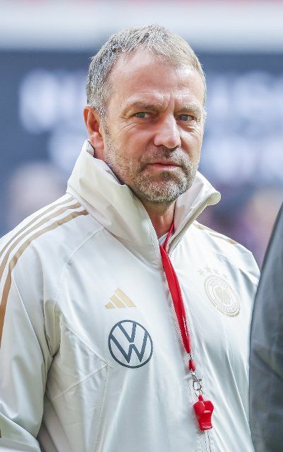 25 September 2022, Saxony, Leipzig: Soccer: Nations League, final training before the match against England at the Red Bull Arena in Leipzig. National coach Hansi Flick leads the training. Photo: Jan Woitas\/dpa