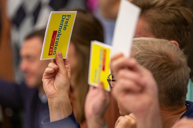 25 September 2022, Bavaria, Munich: Eligible voters cast their ballots during the presentation of the direct candidates of the FDP München-Mitte for the Bavarian state election 2023 at the Paulaner Bräuhaus in Munich. Photo: Lennart Preiss\/dpa