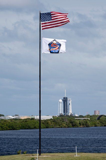The American flag and a flag bearing the patch for NASA\u0092s SpaceX Crew-5 mission are seen at the Press Site and NASA\u0092s Kennedy Space Center, Tuesday, Oct. 4, 2022, in Florida. NASA\u0092s SpaceX Crew-5 mission is the fifth crew rotation mission of the SpaceX Crew Dragon spacecraft and Falcon 9 rocket to the International Space Station as part of the agency\u0092s Commercial Crew Program. NASA astronauts Nicole Mann and Josh Cassada, Japan Aerospace Exploration Agency (JAXA) astronaut Koichi Wakata, and Roscosmos cosmonaut Anna Kikina are scheduled to launch at 12:00 p.m. EDT on Oct. 5 from Launch Complex 39A at the Kennedy Space Center. Mandatory Credit: Joel Kowsky \/ NASA via CNP
