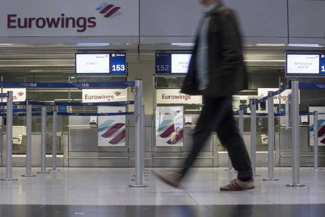 06 October 2022, North Rhine-Westphalia, Duesseldorf: Empty check-in counters at Düsseldorf Airport. Eurowings pilots go on all-day strike. The pilots\