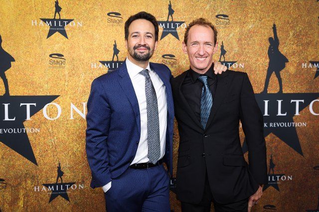 06 October 2022, Hamburg: Lin-Manuel Miranda (l), composer and author of the musical "Hamilton," and Jeffrey Seller, U.S. theatrical producer of the musical, walk the red carpet for the German premiere of the musical "Hamilton" at Operettenhaus Hamburg. The musical production about the rise and fall of the American founding father Alexander Hamilton is accompanied by a mix of very different musical styles, such as rap, hip hop, R&B, pop, soul and jazz. Photo: Christian Charisius\/dpa