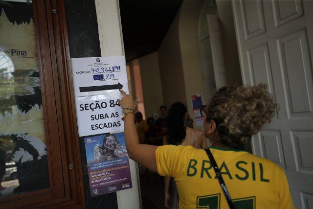 02 October 2022, Brazil, Manaus: Voters head to polling stations in Manaus in the first round of the 2022 elections. Amid a heated atmosphere and extreme social division, millions of Brazilians have elected a new president. Photo: Lucas Silva\/dpa