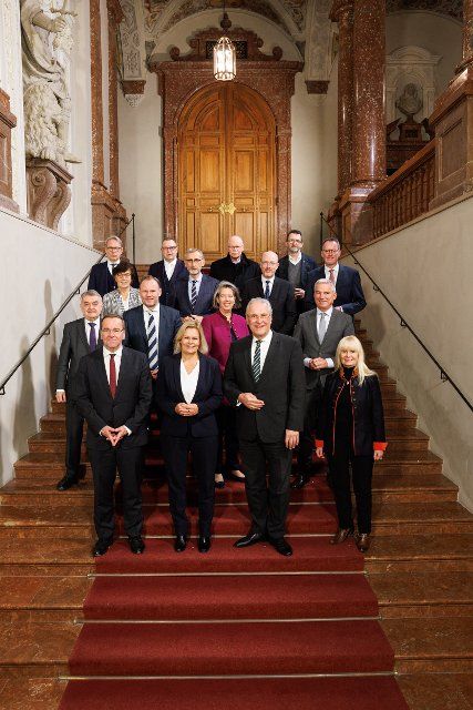 01 December 2022, Bavaria, Munich: The interior ministers and senators of the German states stand on a staircase in the Munich Residenz during a photo session as part of the fall conference of interior ministers. Front row (l-r): Boris Pistorius (SPD), interior minister of Lower Saxony, Nancy Faeser (SPD), federal interior minister, Joachim Herrmann (CSU), interior minister of Bavaria, and Iris Spranger (SPD), senator for interior affairs in Berlin. Second row (l-r): Herbert Reul (CDU), Interior Minister of North Rhine-Westphalia, Andy Grote (SPD), Interior Senator of Hamburg, Tamara Zieschang (CDU), Interior Minister of Saxony-Anhalt, and Thomas Strobl (CDU), Interior Minister of Baden-Württemberg. Third row: Sabine Sütterlin-Waack (CDU), Interior Minister of Schleswig-Holstein, Armin Schuster (CDU), Interior Minister of Saxony, Christian Pegel (SPD), Interior Minister of Mecklenburg-Western Pomerania, and Michael Ebling (SPD), Interior Minister of Rhineland-Palatinate. Fourth row: Georg Maier (SPD), 