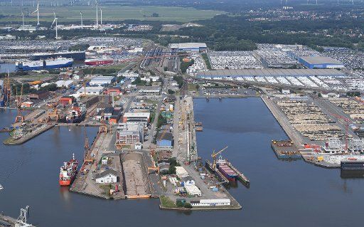 15 June 2018, Germany, Bremerhaven: The aerial view shows the port with the car terminal in the background. Photo: Carmen Jaspersen\/