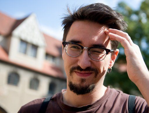 05 September 2018, Germany, Halle\/Saale: Marko Dinic, Serbian-Austrian author, stands in the courtyard of the Moritzburg in Halle\/Saale. Dinic is currently a writer-in-residence in Saalestadt. Photo: Hendrik Schmidt\/dpa-Zentralbild\/