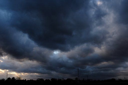 14 March 2019, North Rhine-Westphalia, Düsseldorf: Dark rain clouds are streaming over Düsseldorf. Photo: Martin Gerten\/