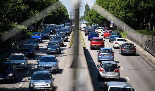 07 June 2019, Bavaria, Munich: In the early afternoon, professional and holiday traffic jams up on the Mittlerer Ring in both directions. Photo: Sven Hoppe\/