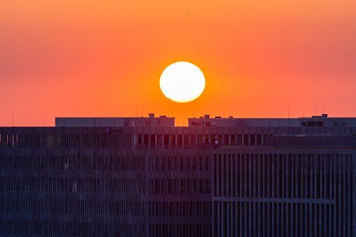 26 June 2019, Berlin: The sun sets over the future Federal Ministry of the Interior. Photo: Lisa Ducret\/
