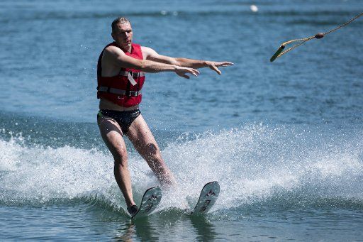 27 June 2019, Thuringia, Erfurt: A water skier loses the holding rope at Erfurt\