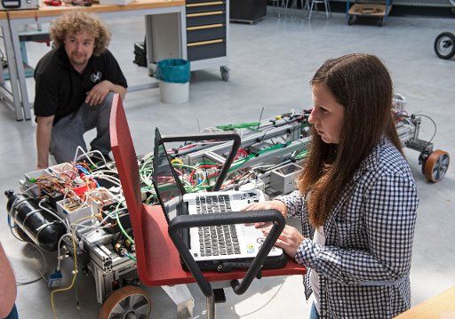 Students Jan Cordes and Christina Tsiroglou of the joint HyperPod project of Oldenburg University and the Emden-Leer University of Applied Sciences prepare their magnetic railway prototype, "HyperPod", for a vacuum test at the Centre for Applied ...