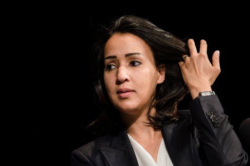 Manal al-Sharif, who in 2011 sat behind the steering wheel of a car in Saudia Arabia despite a driving ban for women, reading from her book "Daring to Drive: A Saudi Woman\