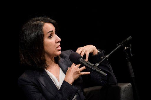Manal al-Sharif, who in 2011 sat behind the steering wheel of a car in Saudia Arabia despite a driving ban for women, reading from her book "Daring to Drive: A Saudi Woman\