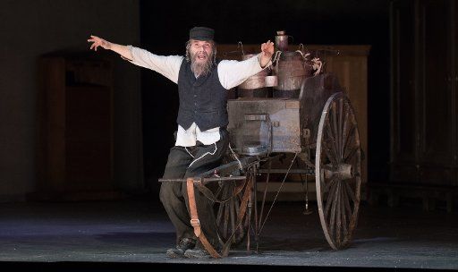 Actor Max Hopp as Milkman Tevje performs on stage during a photo rehearsal of the musical \