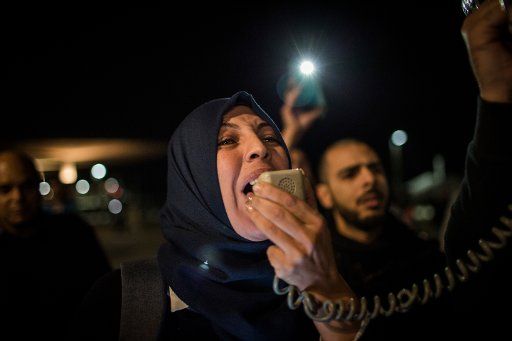 A woman shouts slogans as she takes part in a protest against the decision of US-President Trump to recognize Jerusalem as the capital of Israel, outside the US Embassy in Tel Aviv, Israel, 12 December 2017. Photo: Ilia Yefimovich\/