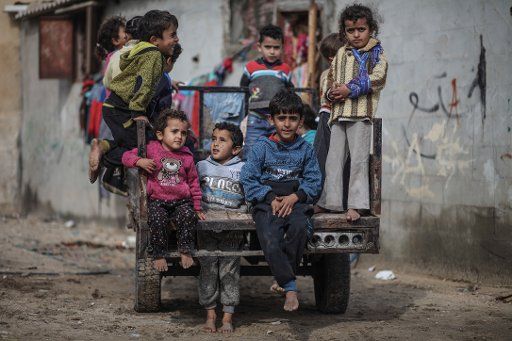 Palestinian children play outside their houses in Al-Shati refugee camp in Gaza City, Gaza, 15 January 2018. Photo: Wissam Nassar\/