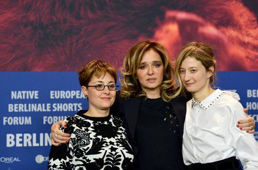 18 February 2018, Germany, Berlin, Press Conference, "My daughter" ("Figlia mia"): Actresses Valeria Golino (C), Alba Rohrwacher and the director Laura Bispuri. The film is part of the 68th Berlinale competition. Photo: Jens Kalaene\/dpa-Zentralbild\/
