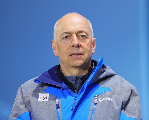 19 February 2018, South Korea, Pyeongchang, Olympics, Award Ceremony, Medal Plaza: Dexter Pain, vice president of the European Ski Federation (FIS) waits for an award ceremony. Photo: Michael Kappeler\/