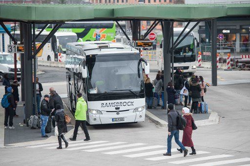 26 March 2018, Germany, Berlin: Passengers wait at the central bus station (ZOB). After an extraordinary low number of passengers in 2017, probably due to several construction works, Berlin\