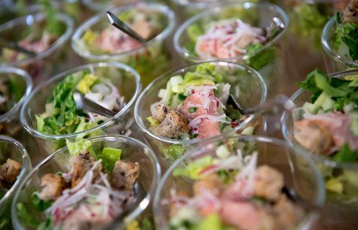 12 April 2018, Germany, Munich: Glasses with salad are served at a buffet during a ceremony. Photo: Sven Hoppe\/