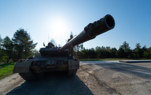 19 April 2018, Germany, Munster: A tank of the model Leopard 2 A7 stands at the training grounds of the German Bundeswehr. Photo: Philipp Schulze\/