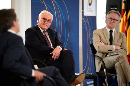 23 May 2018, Berlin, Germany: Christoph Möllers (l-r), Professor of Public Law and Philosophy of Law, Federal President Frank-Walter Steinmeier and the writer David Van Reybrouck discuss "Forum Bellevue on the future of democracy" at the event. The topic of the discussion event is «Society without Politics? Liberal democracies in the test ». Photo: Sina Schuldt\/