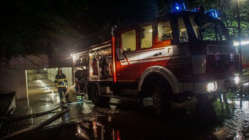 01 June 2018, Germany, Sindelfingen: The fire department pumps water from an underpass after heavy rainfall. In the night before Friday, several parts of Germany were affected by storms. Photo: Sdmg \/ Dettenmeyer\/SDMG\/