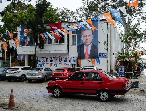 29 May 2018, Turkey, Koycegiz: A image of Turkish President Recep Tayyip Erdogan and flags of his AKP party. - NO WIRE SERVICE - Photo: Jens Kalaene\/dpa-Zentralbild\/
