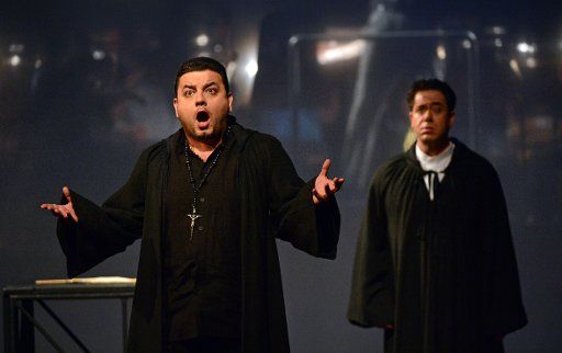 Ghazaryan (L-R) as Pimen and Richard Carlucci as Grigorij rehearse a scene from the opera \