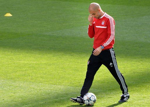 Coach Josep Guardiola during the final training of FC Bayern Munich in Madrid, Spain, 22 April 2014. Bayern Munich faces Real Madrid in the Uefa Champions League semifinals first leg match on 23 April 2014. Photo: Peter Kneffel\/
