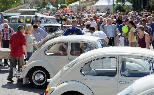 Thousands of people visit the factory during an open at the Volkswagen (VW) plant in Emden, Germany, 18 May 2014. The open day took place on the occasion of the 50th anniversary of the car factory at the sea. Photo: INGO WAGNER\/