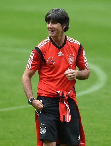 Head coach Joachim Loew smiles during a training session of the German national soccer team on a training ground in St. Leonhard in Passeier, Italy, 23 May 2014. Germany\
