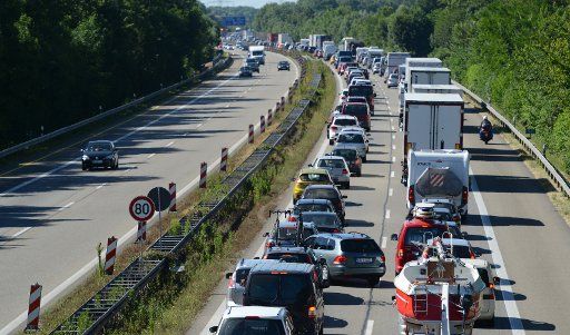 A traffic jam after at the end of pentecist school holiday is seen at a construction sight on autobahn A5 near Riegel, Germany, 21 June 2014. Photo: PATRICK SEEGER\/