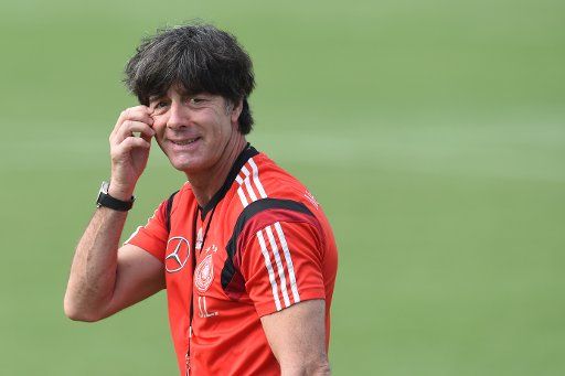 Head coach Joachim Loew getures during a training session of the German national soccer team in Santo Andre, Brazil, 12 June 2014. The FIFA World Cup 2014 will take place in Brazil from 12 June to 13 July 2014. Photo: Andreas Gebert\/