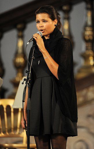 Aida Boehm sings at the memorial service of her father Karlheinz Boehm in Salzburg, Germany, 13 June 2014. The actor and founder of the Ethopia aid organisation \