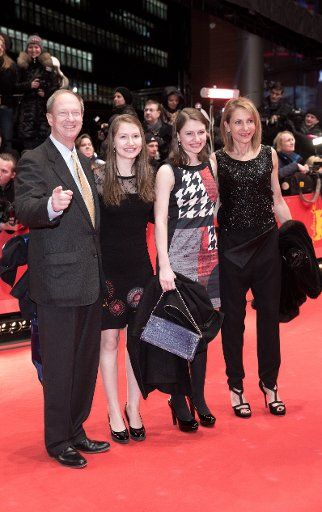 US Ambassador John B Emerson, his daughters Jacqueline and Hayley, and his wife Kimberly Marteau Emerson arrive to the premiere of Cinderella at the 65th International Film Festival in Berlin, Germany, 13 February 2015. Photo: Tim Brakemeier\/