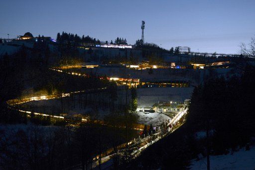 A view of the illuminated toboggan run during the Bobsleigh & Skeleton World Championships in Winterberg, Germany, 28 February 2015. Photo: Caroline Seidel\/