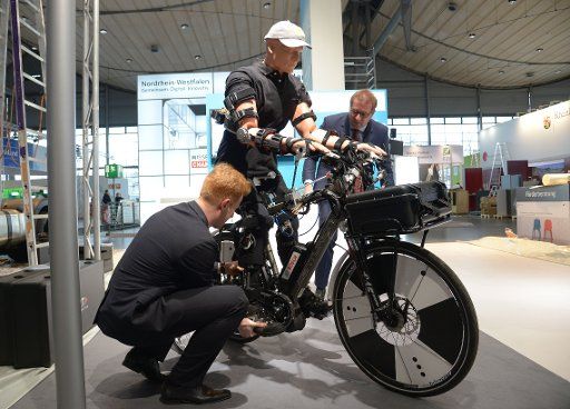 An E-Bike with a dynamic safety system at the stand of the German Federal Ministry for Education and Research (Bundesministerium fuer Bildung und Forschung) at the CeBIT technology fair in Hanover, Germany, 14 March 2015. PHOTO: PETER STEFFEN\/
