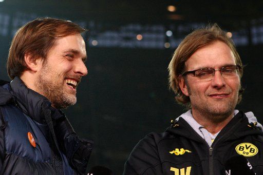 FILE - A file photo dated 03 March 2012 shows Mainz coach Thomas Tuchel (L) and Dortmund coach Juergen Klopp during an interview before kick-off at the German Bundesliga soccer match between Borussia Dortmung and FSV Mainz 05 in Signal Iduna Park in ...