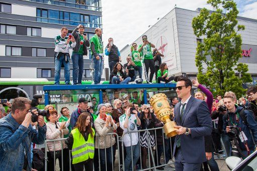 VfL Wolfsburg player Diego Benaglio holds the DFB Cup in Wolfsburg, Germany, 31 May 2015. Wolfsburg won the German DFB Cup for the first time on 30 May 2015 with a comfortable 3-1 win over Borussia Dortmund in Berlin. Photo: PHILIPP VON DITFURTH\/