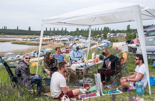 Festival-goers at the Sputnik Springbreak music festival in Pouch, Germany May 23 2015. The Springbreak festival is one of the first of the festival season. It takes place from 22 to 25 May 2015. Photo: OLE SPATA\/