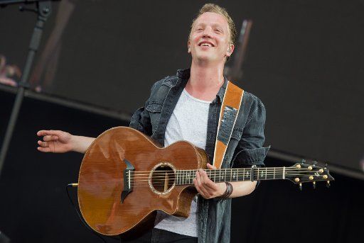 Singer Joris performs on stage with his band at the fair \