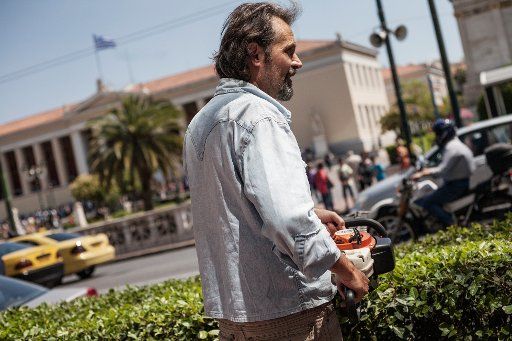 Municipal gardener Charilaos, aged 50, is pictured in Athens on the 23rd of June 2015. He thinks that Greece should leave the Eurozone. Photo: Socrates Baltagiannis\/dpa (zu dpa «Volkes Stimme zum griechischen Schuldendrama» vom 24.06.2015)