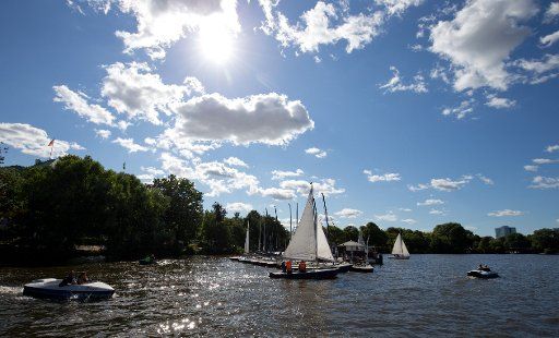 Sailing boats of a sailing school make their way across the Alster river in Hamburg, Germany, 07 September 2015. Photo: CHRISTIAN CHARISIUS\/